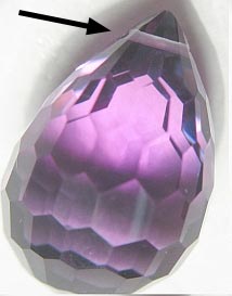 Cross-drilled amethyst briolette.